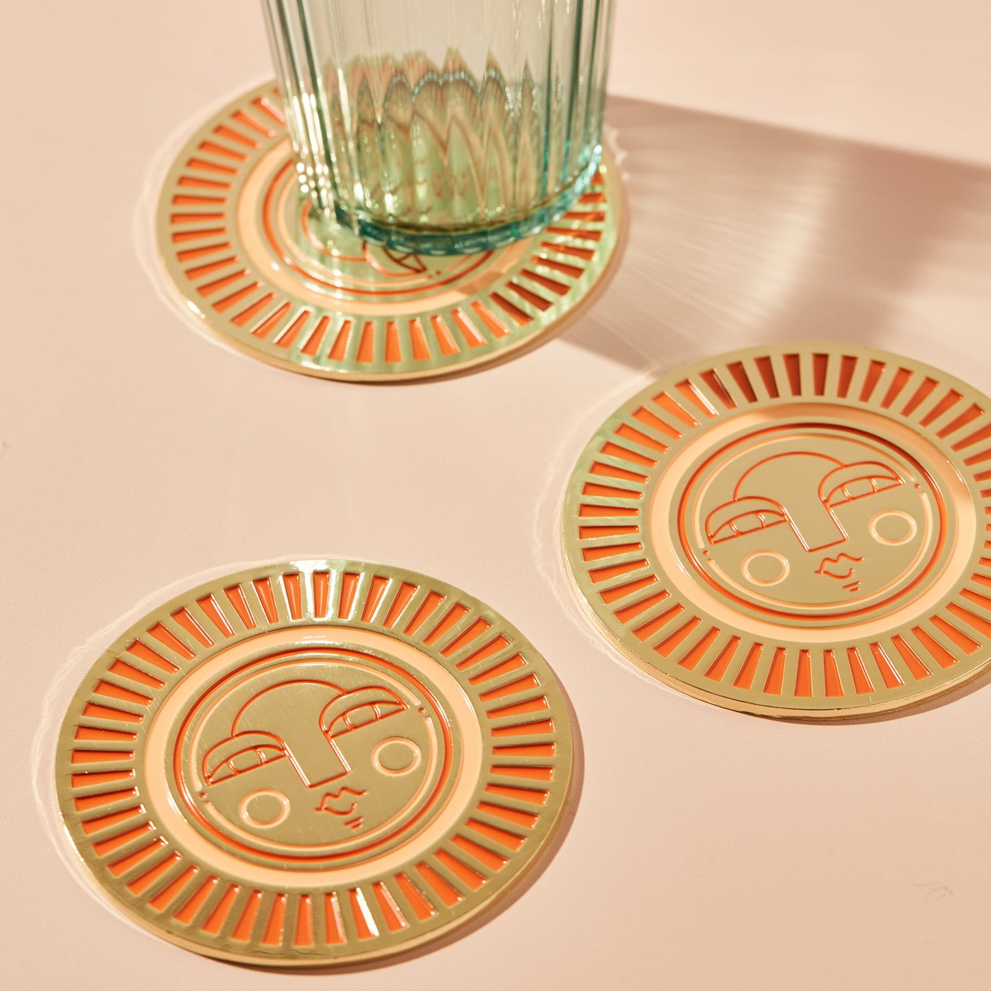 The Sol Coaster in peachy orange